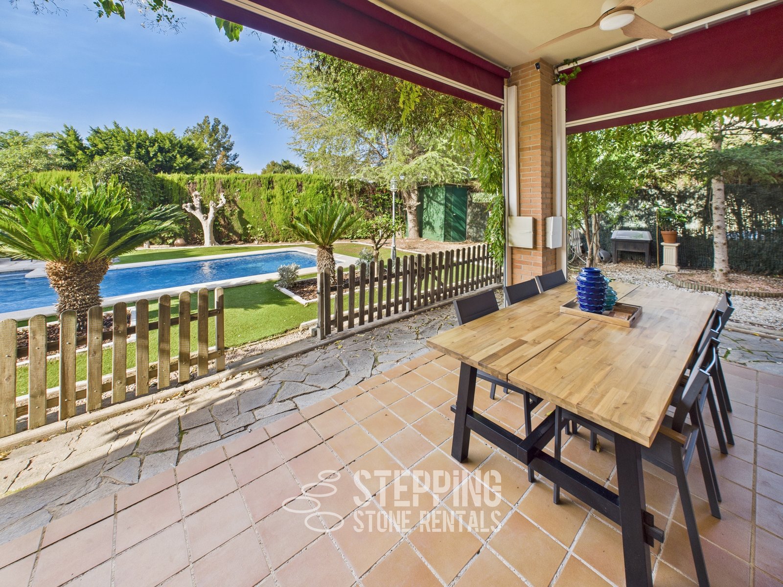 Outdoor dining with pool views